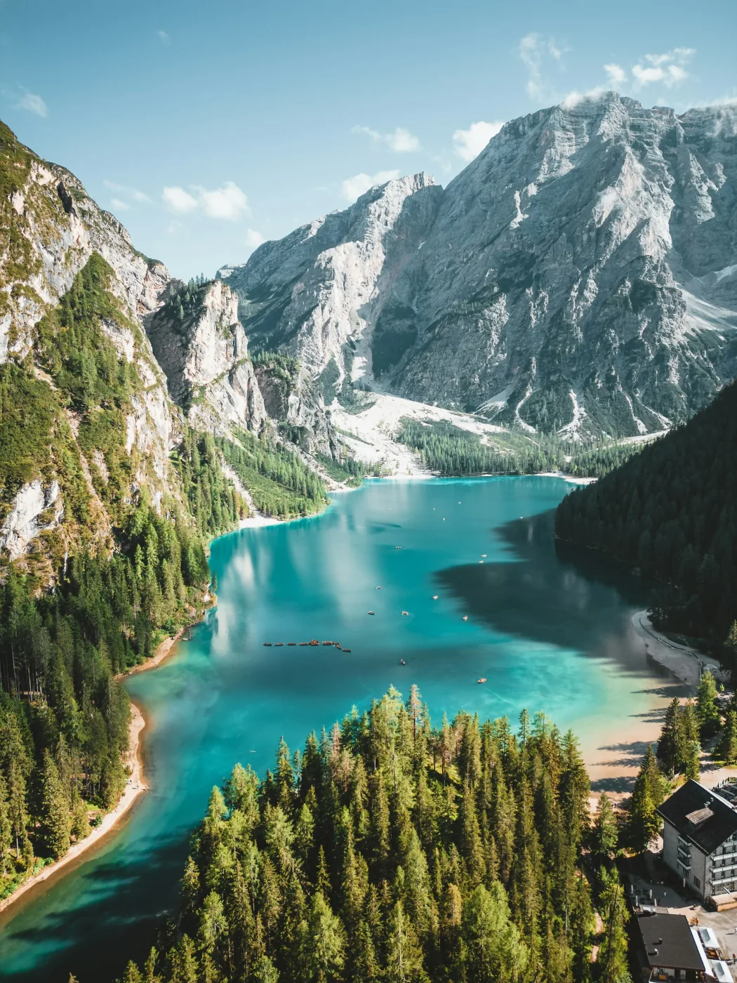 Turquoise water beneath the mountains at Lago di Braies
